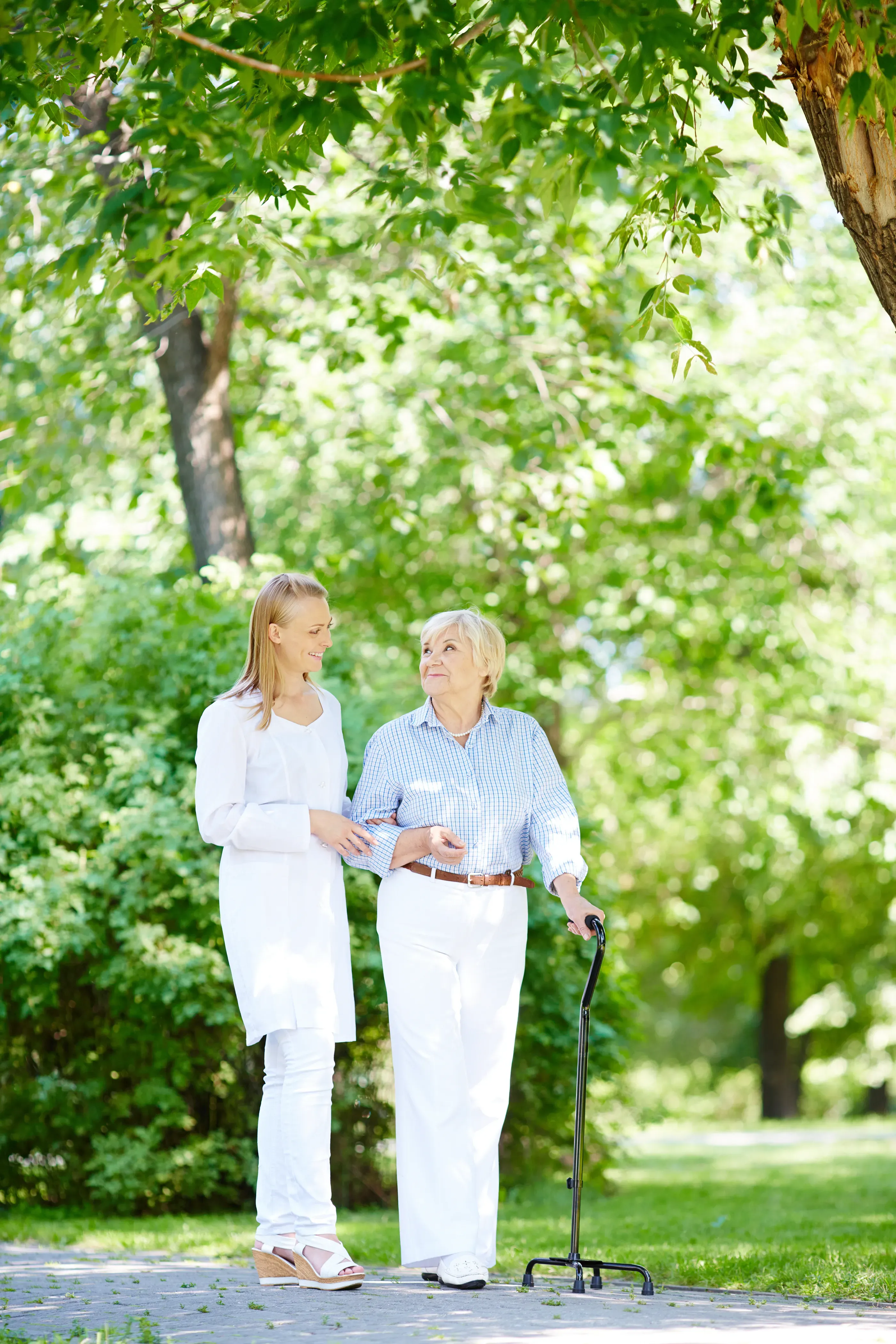 A Personal Promise care professional and a client sharing a peaceful moment in a living room.